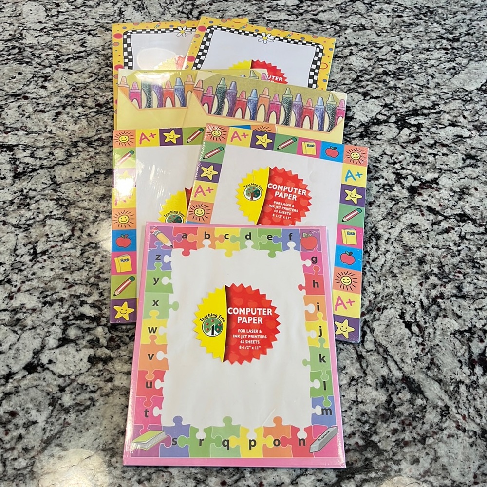 7 New never opened computer paper. 40 sheets per pack. Laser and ink jet printer